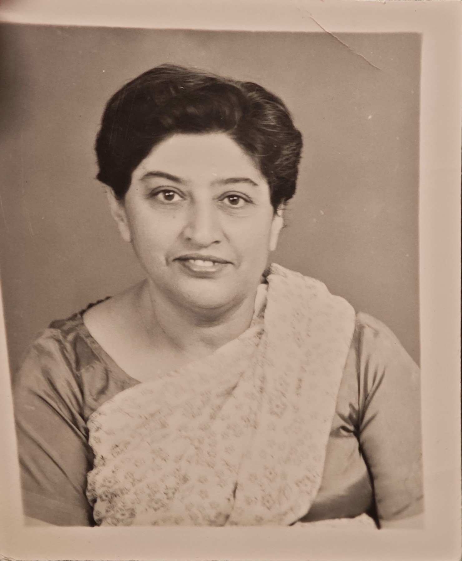Portrait of Villoo Dubash in a sari, captioned 1957.